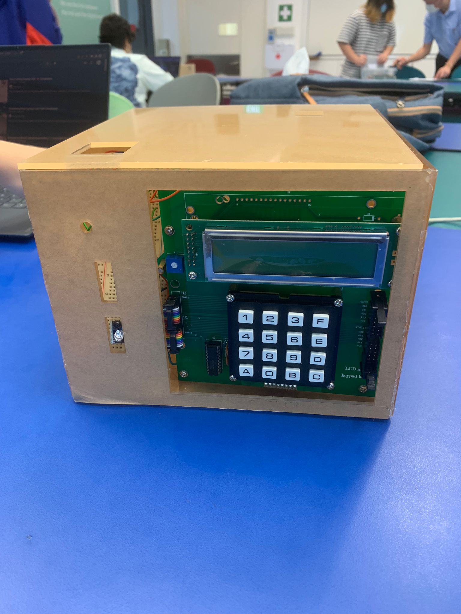 Smart Sleep Inducer prototype mounted in an MDF enclosure showing the 20×4 LCD display and 4×4 keypad on the front panel